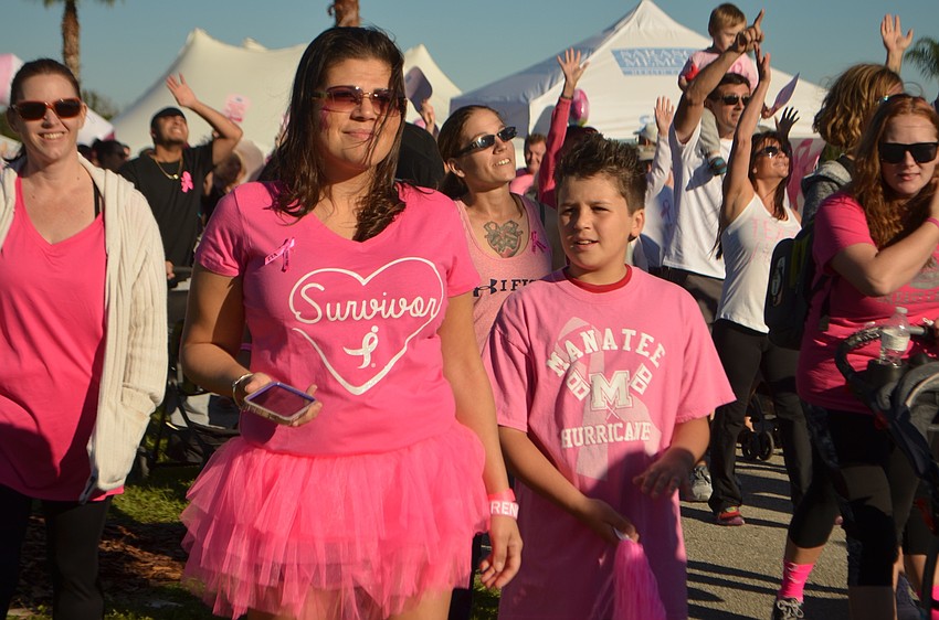 Lakewood Ranch's Jenyva Johnson walks with her son, Evan.