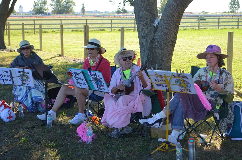 Sarasota ukulele group, The Hawaiian Shirts, provide entertainment during the Strides Against Breast Cancer Walk.
