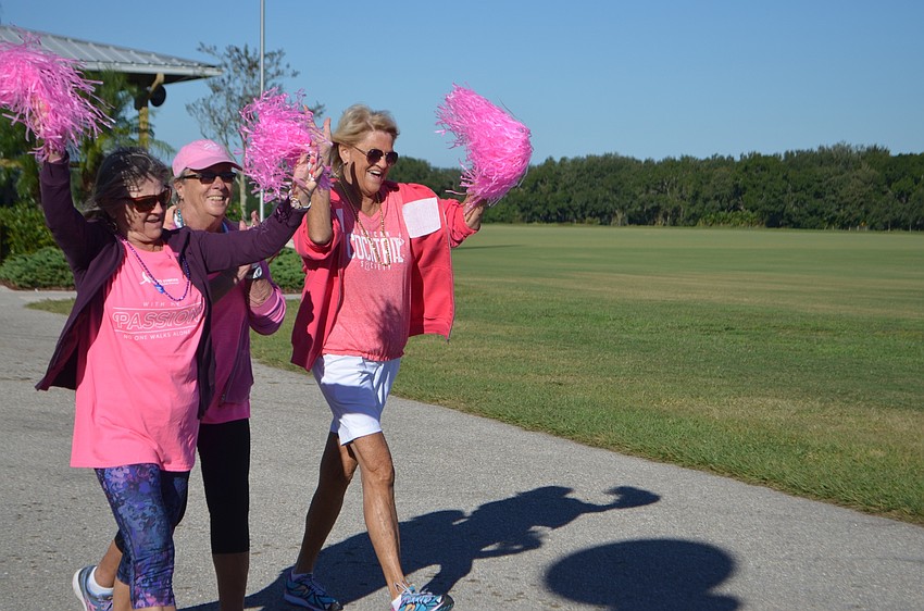 Lakewood Ranch's Susan Link, Sarasota's Mary Cusimano and Bradenton's Cassie Jewell, celebrate their completion of the Strides Against Breast Cancer Walk.