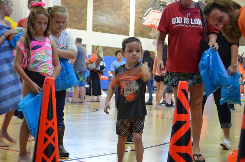 Hawk Strouse tosses a ring during a game.
