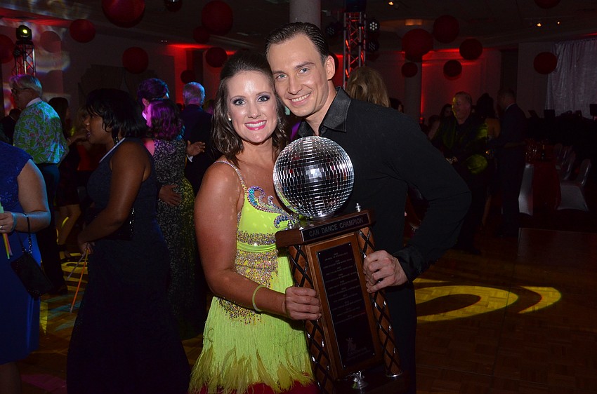 CANDance 2016 champions Jennifer Rust and Max Lototskyy show off their first place trophy for the People's Choice Award.