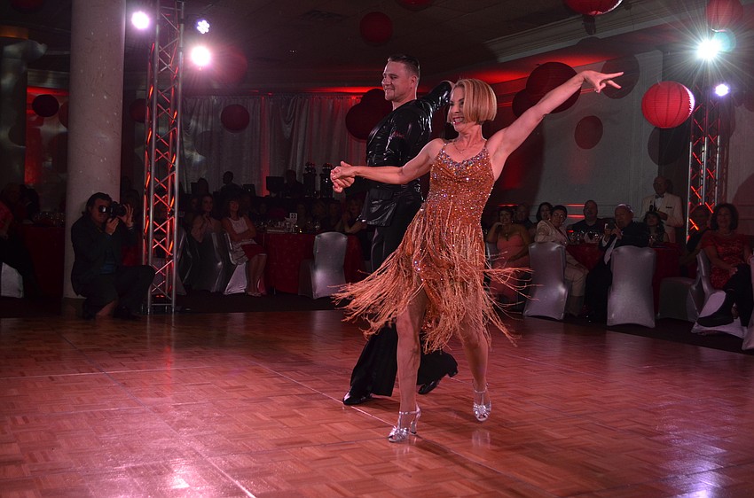 Alix Redmonde performs with partner Vidas Orlovas.