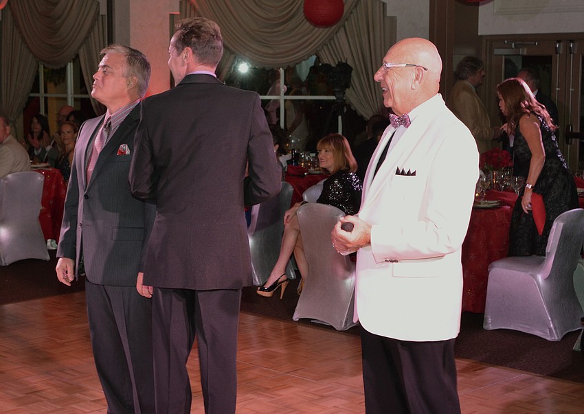 Emcee Bob Nosal smiles as he introduces the men of CANDance.