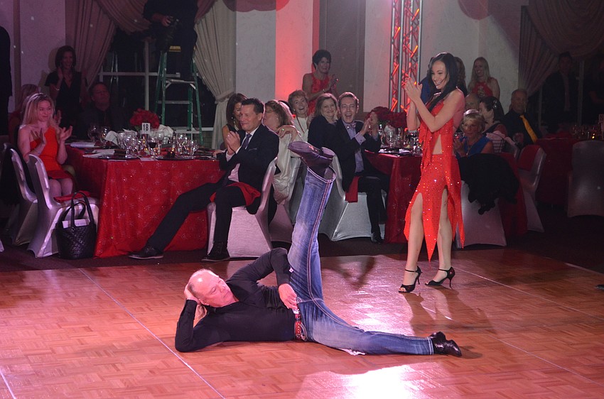 Les McCurdy poses at the end of his performance with partner Tanya Vy.