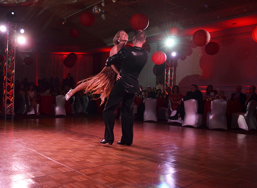 Alix Redmonde performs with partner Vidas Orlovas.