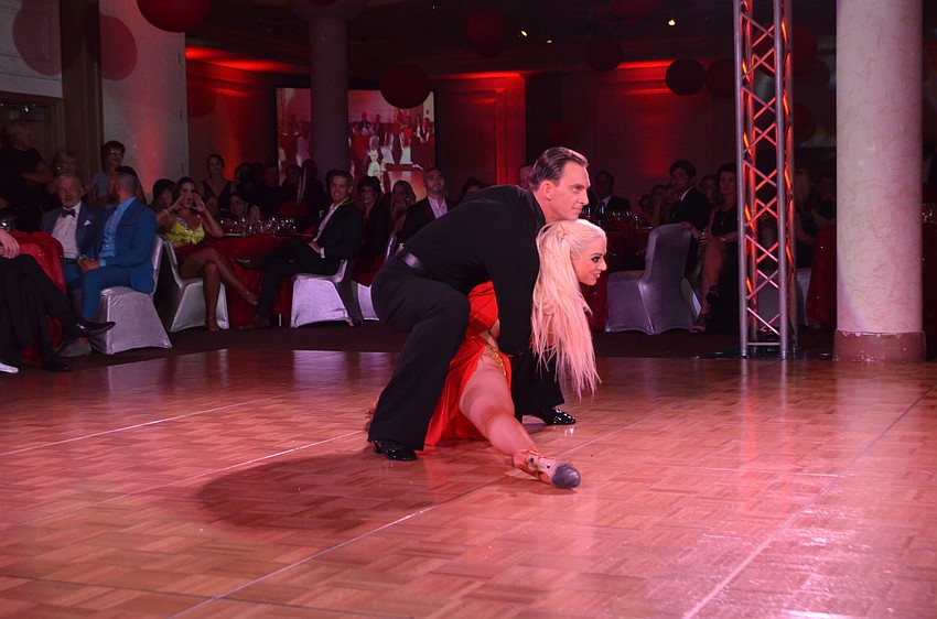 Professional dancers Max Lototskyy and Sarah Haworth perform for the Professional Dance Exhibition of the evening.