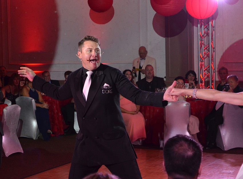 Bart Lowther provides the vocals for his dance performance with partner Sonia Ragan.