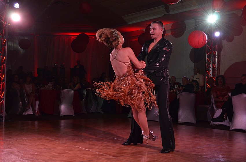 Alix Redmonde performs with partner Vidas Orlovas.