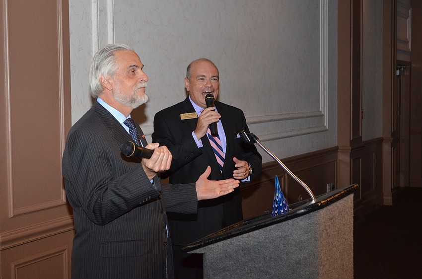 Sarasota Opera Artistic Director Victor DeRenzie and Sarasota Opera Executive Director Richard Russell try to explain to a bummed crowd why the opera won’t feature any Verdi this year (except for one night).