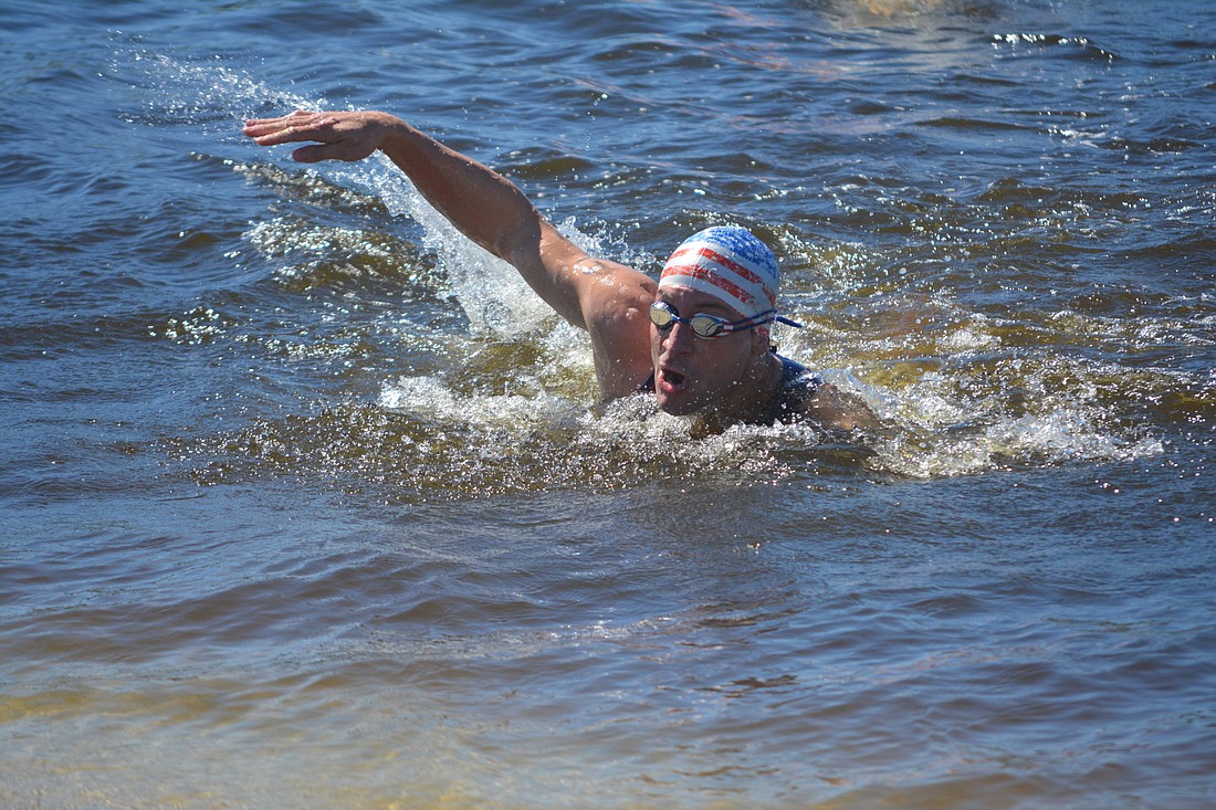 USA's James Lenger swims in the Masters 40-49 race at the UIPM Biathle/Triathle World Championships at Nathan Benderson Park. Lenger finished second.