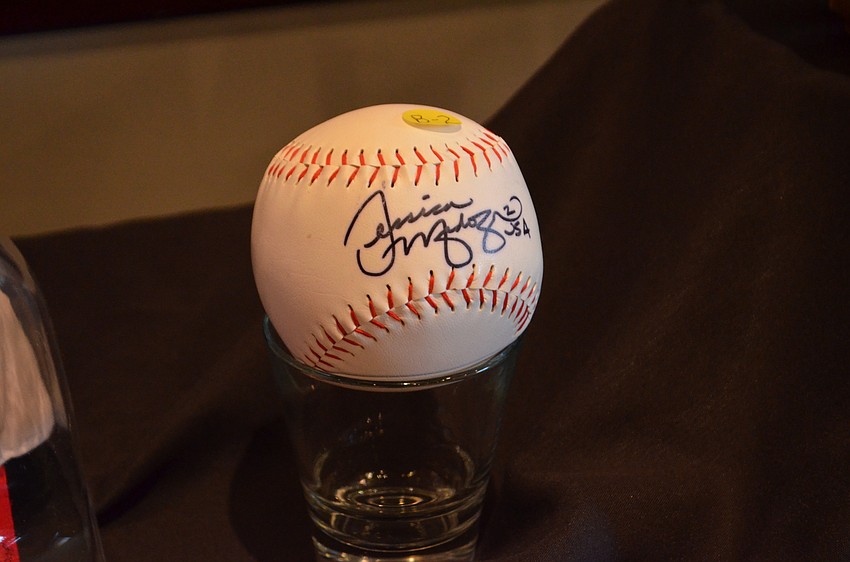 Silent auction items included a baseball signed by Jessica Mendoza.