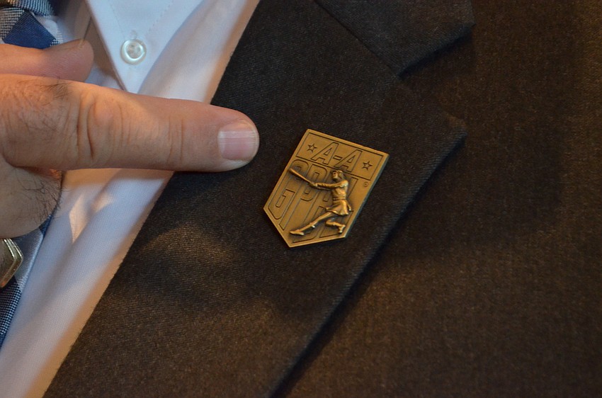 Women's Players Association President Rick Chapman shows support with his pin.
