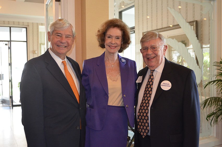 Former Sen. Robert Graham with his wife Adele, and Longboat Key Democratic Club President Murray Bluegrass
