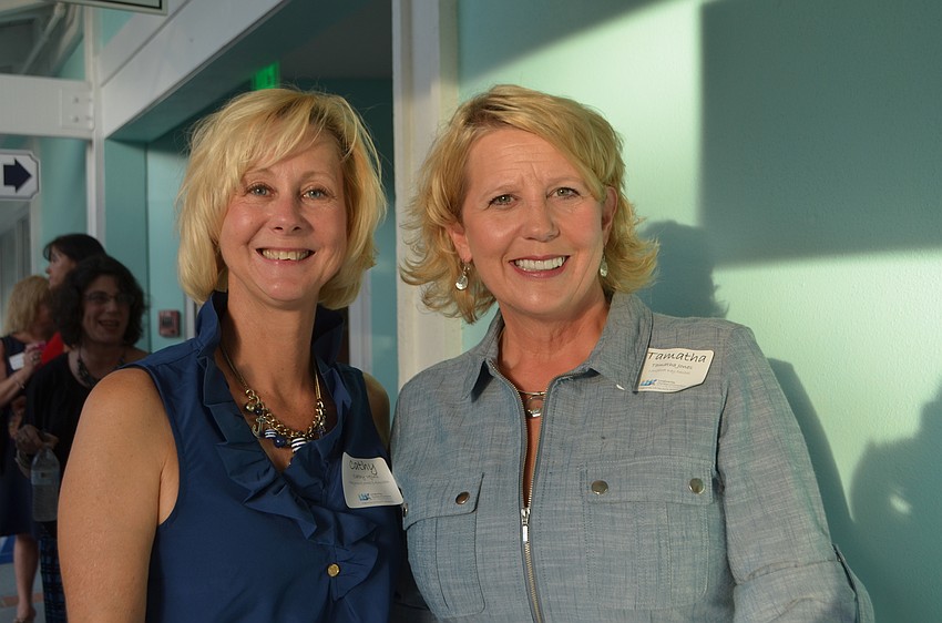 Cathy Vejins of Raymond James and Associates and Tamatha Jones of Longboat Key Dental