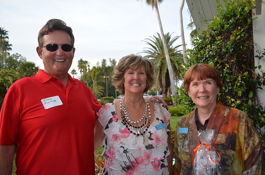 John and Cindy Foster of Richardson Retirement Solutions and Nancy Taussig of Barefoot Weddings