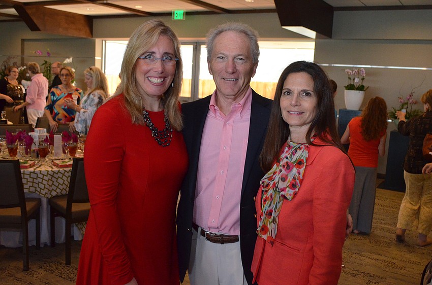 President and CEO Jennifer Rominiecki, Peter Swain and Marcia Jean Taub