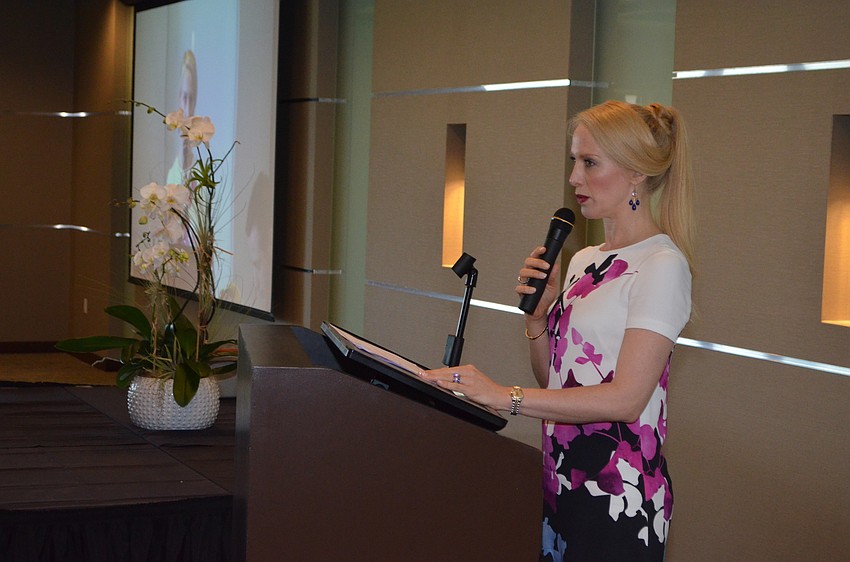 Chair Ariane Dart welcomes guests to the first lecture in the series.