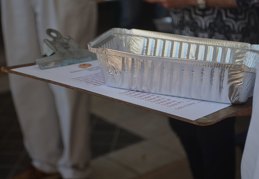 Each challah critic was given a  dish for sampling and sheet to rate each of the challah entries.