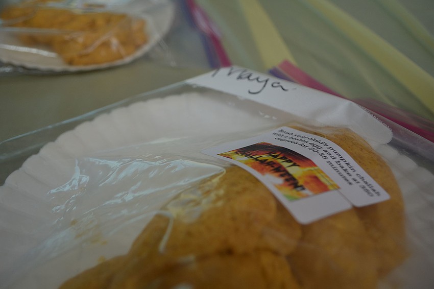 Students braided their own pumpkin-spice challah loaves to take home and bake.