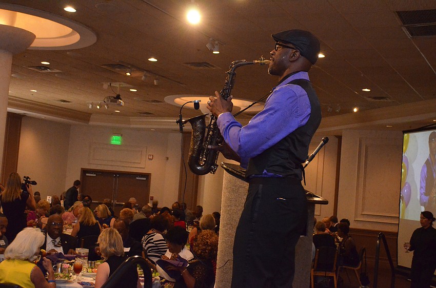 Musician Marton Boone performs.