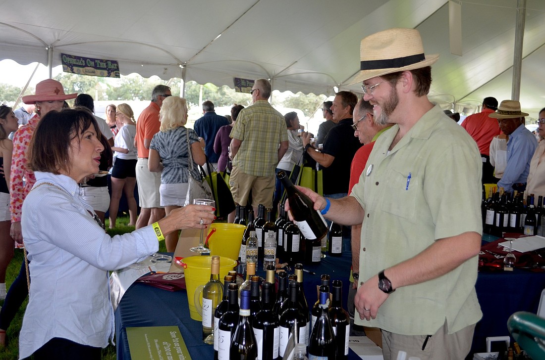 Guests of the 2015 event enjoy sampling 100s of wines from wine vendors from throughout the country. File photo.