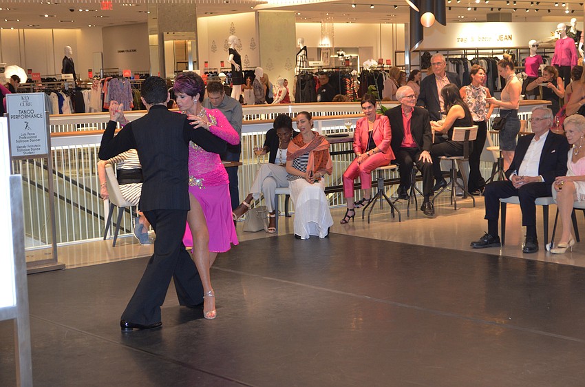 Professional Ballroom Dancer Luis Pena performs the tango with student Wendy Feinstein.