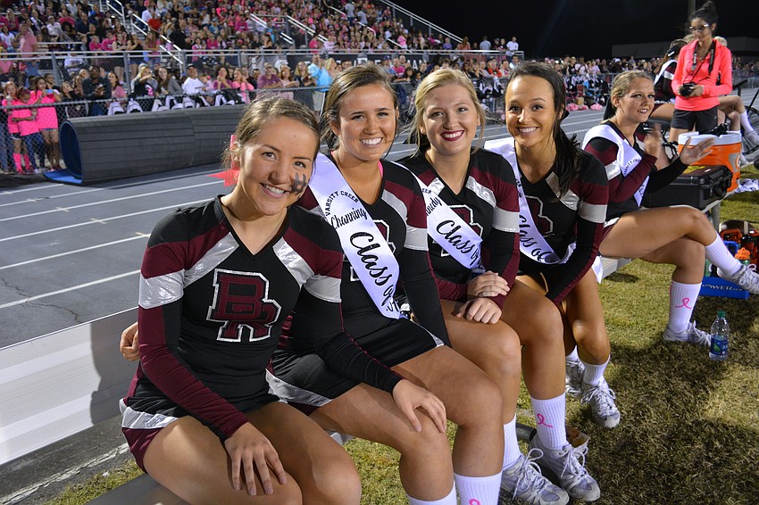 Cheerleaders Lauren Olmsted, Channing Jackson, Kennedy Hunter and Jenna Byrd watch their classmates get named to the homecoming court.