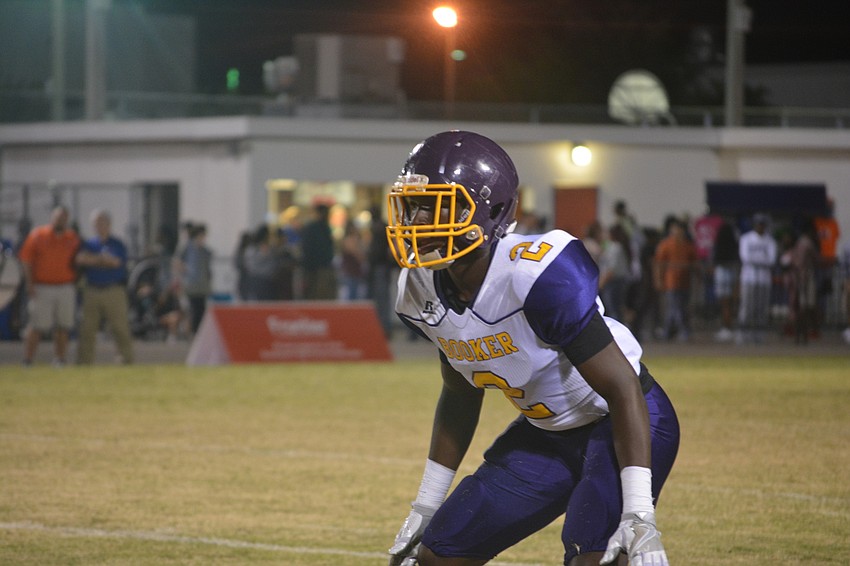 Booker junior defensive back Anthony Thomas stares at his assigned Southeast wide receiver before the snap on Oct. 28.