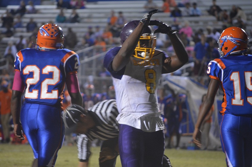 Booker senior running back Jamal Benson celebrates after catching a touchdown against Southeast on Oct. 28.