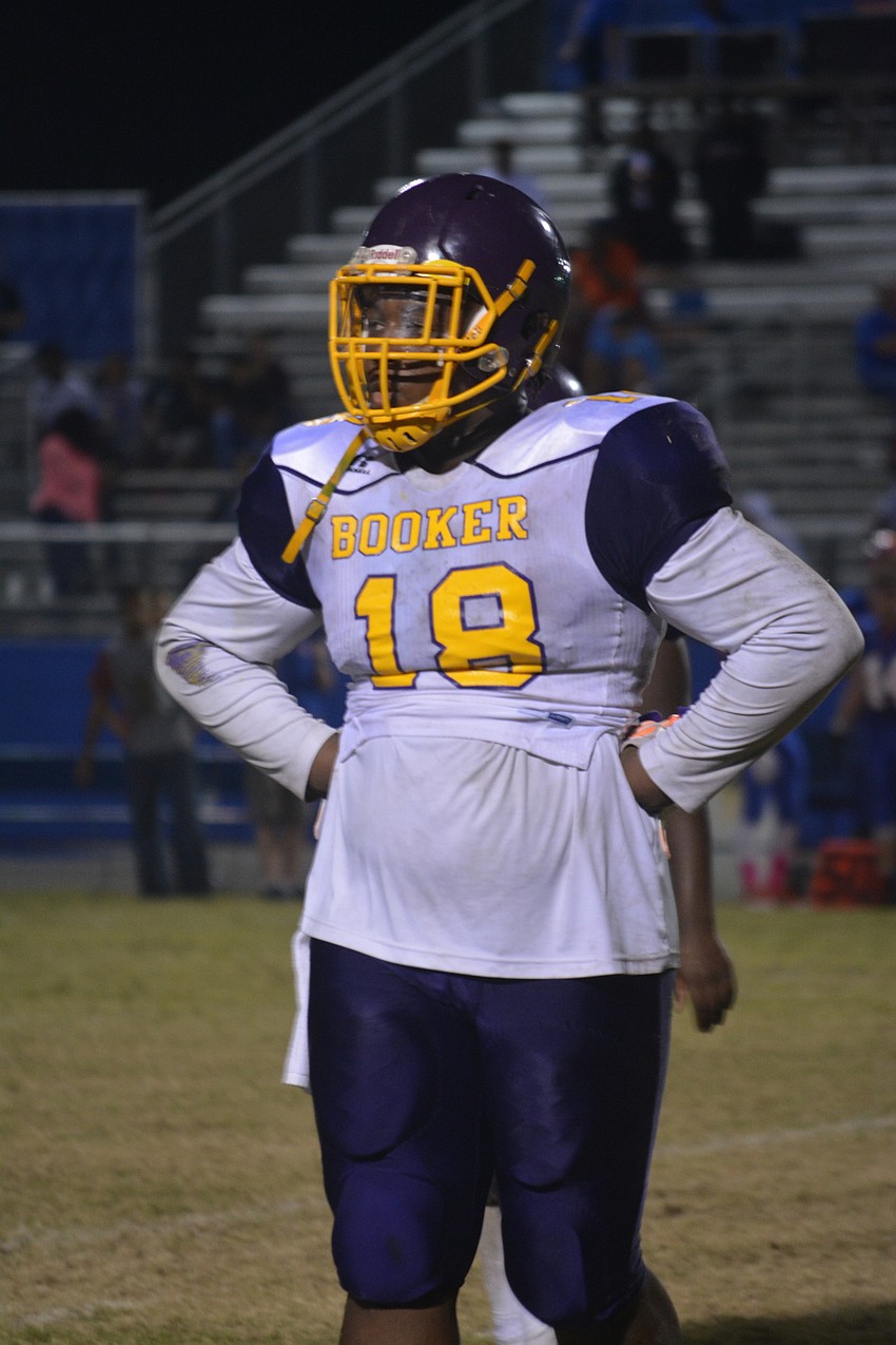 Booker linebacker Jacques Bristol catches his breath during a timeout late in the 4th quarter against Southeast on Oct. 28. The Tornadoes lost 28-21.