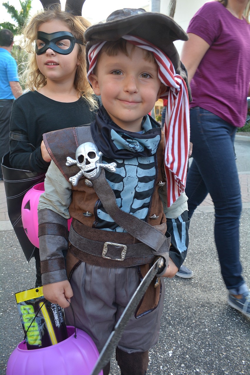 GreyHawk Landing's Will Dolllison chose a pirate theme for his costume. His sister, Claire, behind, chose to be a bat.
