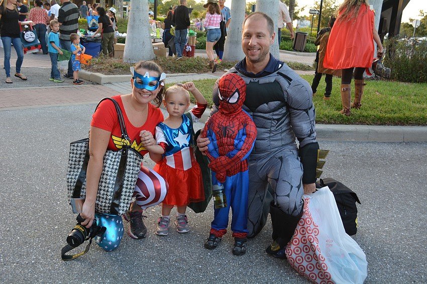 Sarasota's Chiappone family came as superheroes. Pictured are Pam, Isabella, Aiden and Tom.