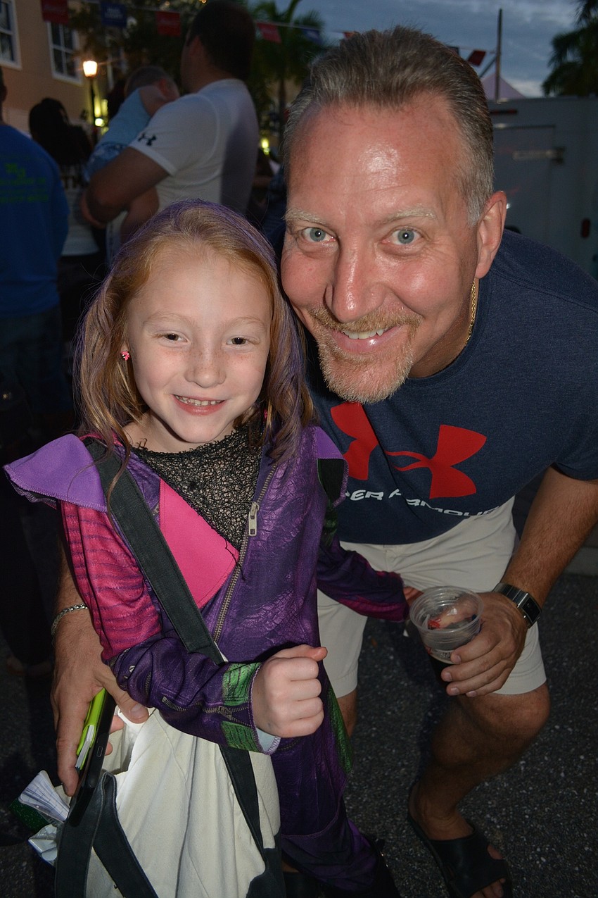 Jolie Hammond, 6, and her dad, Joe, of Lakewood Ranch, came to the Boo Fest on Main Street for the first time.
