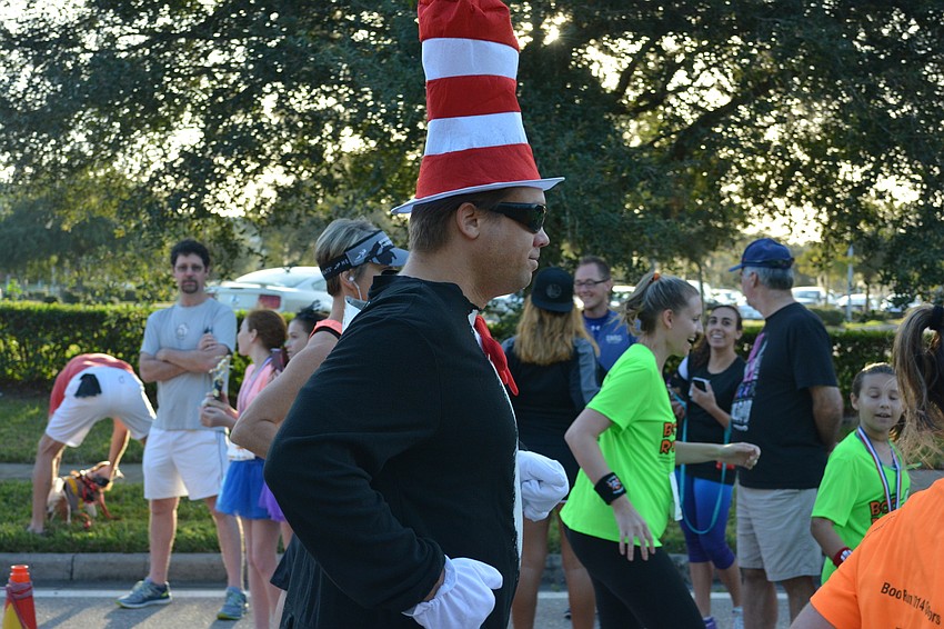 Cat in the Hat Seth Jones manages to balance his very large hat during the run.