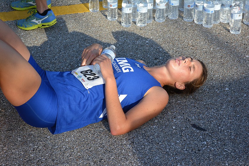 Winning a race isn't all that easy. Just ask women's overall champion Chandler Bergeron of Edenton, N.C., as she tries to catch her breath. Bergeron, who attends IMG Academy, is 17.