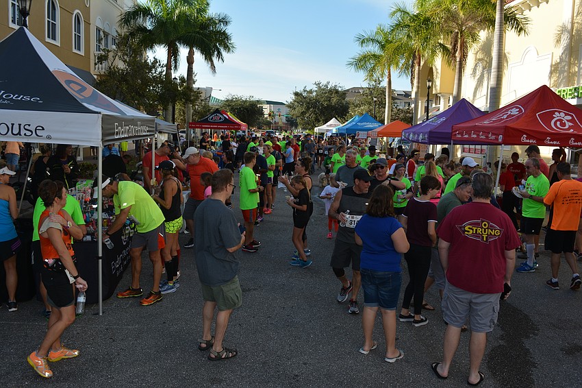 After the race, swarms of participants packed Lakewood Main Street where race sponsors provided them with treats and activities.