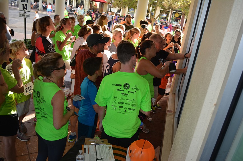 Everybody wants to see their time following the race as the official numbers are posted on a wall.
