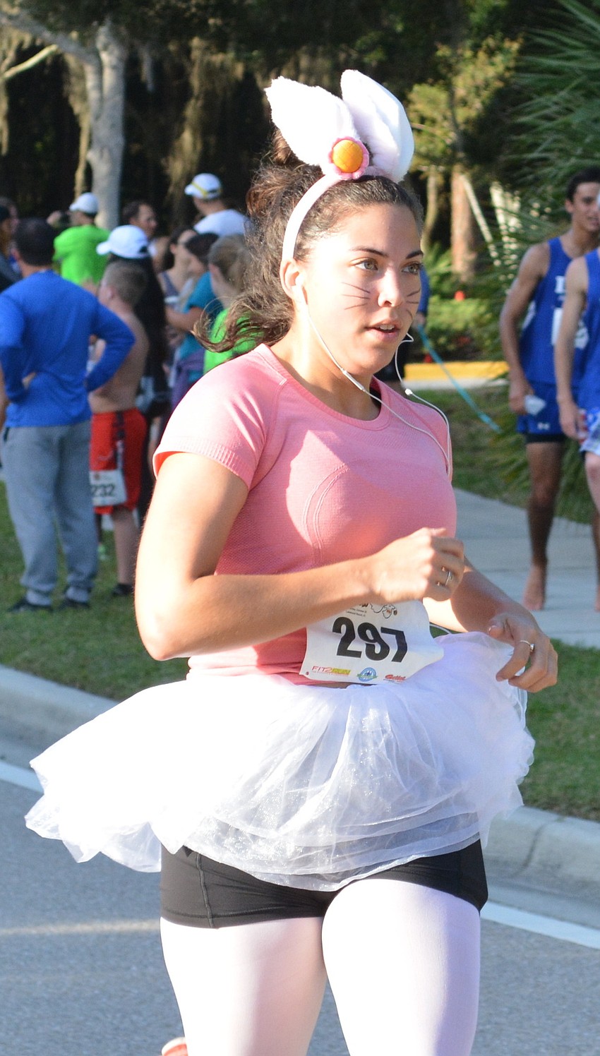 Tani Parkinson of Sarasota ran the race as a bunny. Her friend, Priscilla Lopes, was dressed as a turtle, and was far behind.