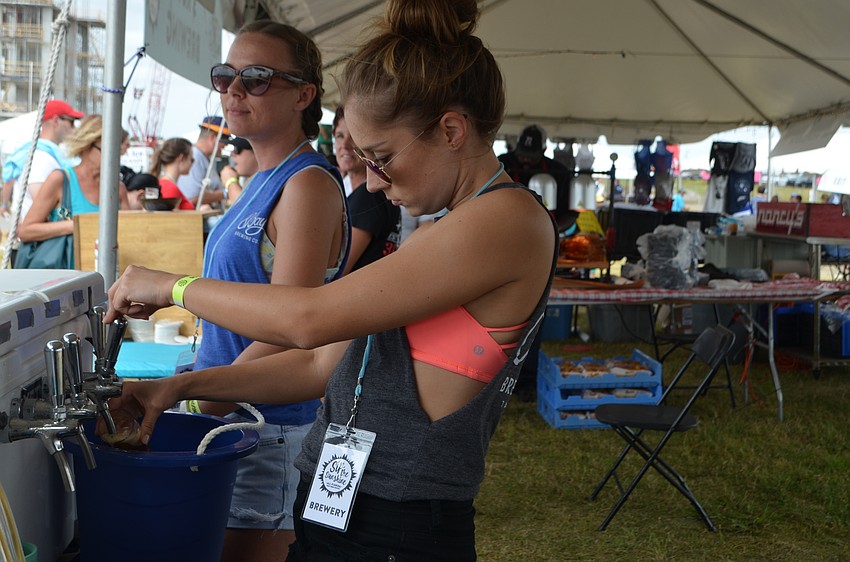 Melissa Owen of 81Bay Brewing Company pours samples during Sip the Sunshine.