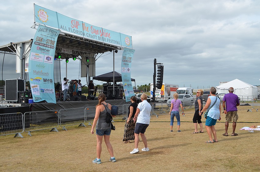 Sip the Sunshine goers danced to Jah Movement Reggae Band.