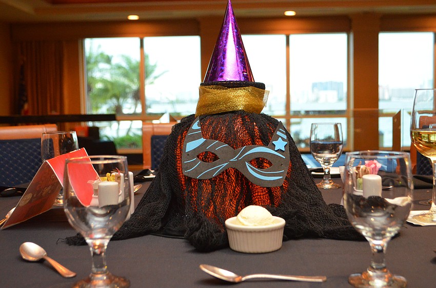 Decorative pumpkins served as the centerpieces.