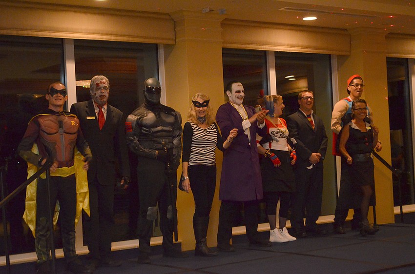 Staff members dressed up for the annual Halloween party and competed in the costume contest.
