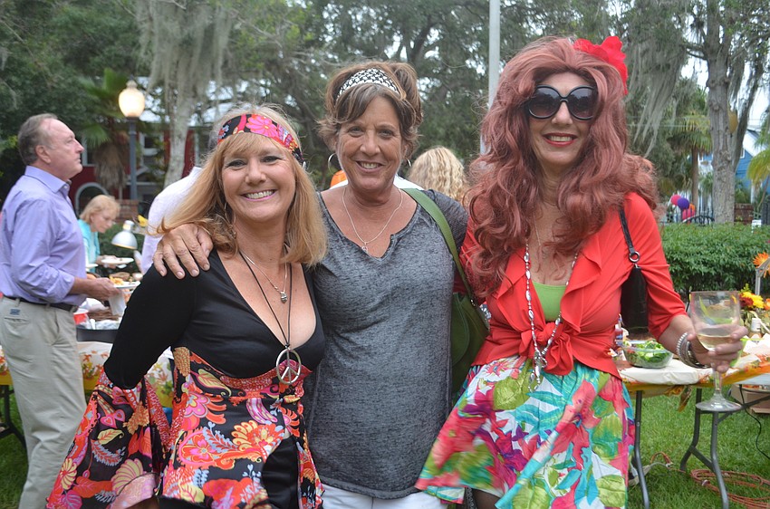AnnaBell Newland, Ellen Silverman and Susie Fairbank. Newland and Fairbank came to the Tunes in the Park potluck from a 60s themed Halloween party.