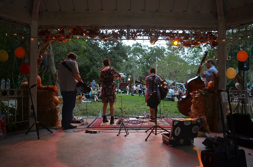 The gazebo was decorated with autumn decorations.