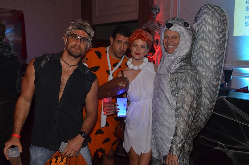 Scott McKenna as “Bodhi,” Jason Fromer as “Fred Flintstone,” Nicole Fromer as “Wilma Flintstone” and Steve Schadt as “squirrel”