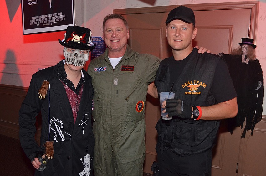 Mike Pawlus as a “New Orleans voodoo guy,” John Yates as “Top-Gun Tom Cruise,” and Ben Mack as a “Seal Team member”