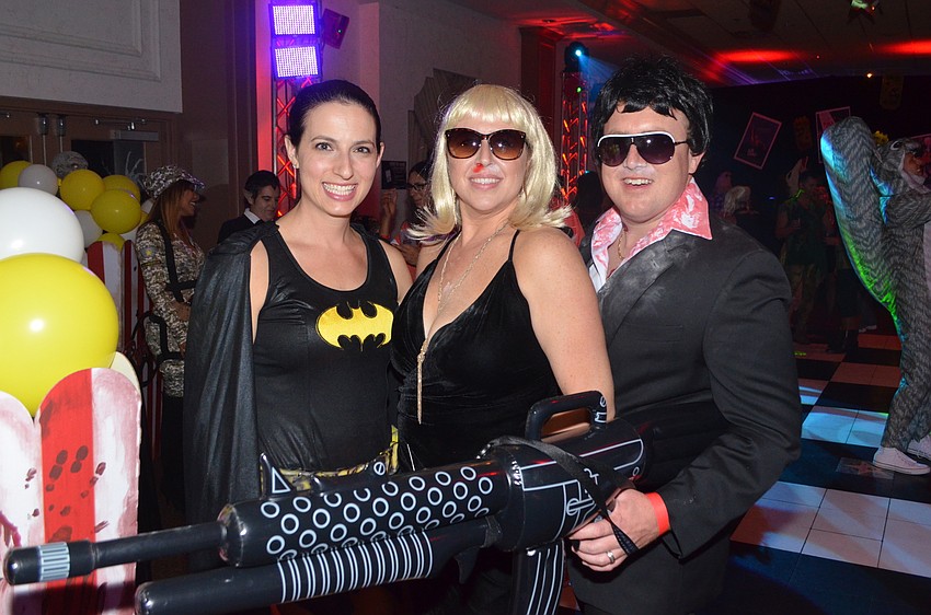 Kyla Weiner as “Batgirl,” Rae Mulligan as “Mrs. Montana” and Mark Mulligan as “Tony Montana”