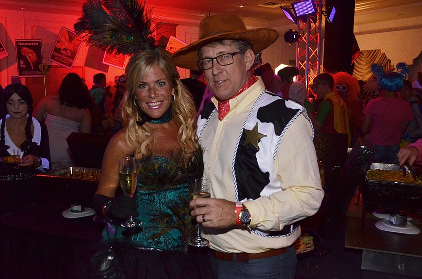 Karen Roche as a “peacock” and Lars Johnson as “Woody”