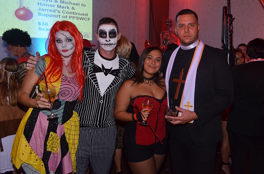 Nora and Paul Noake as “Sally and Jack” from Nightmare Before Christmas with Amanda and Adam Rios as “the sinner and the saint”