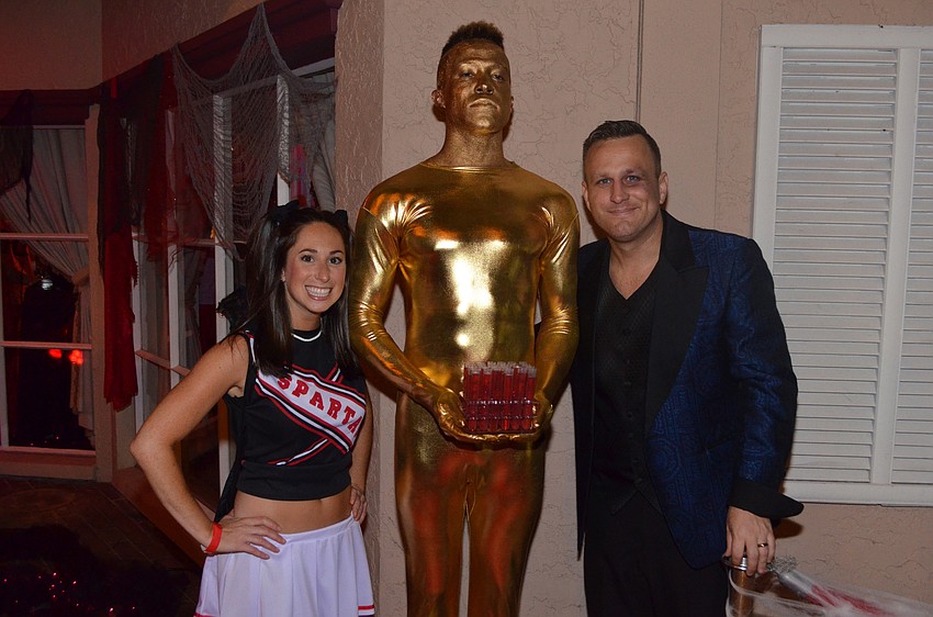 Co-Chairs Sarah Wertheimer and Nick Owens with “Grammy Statue